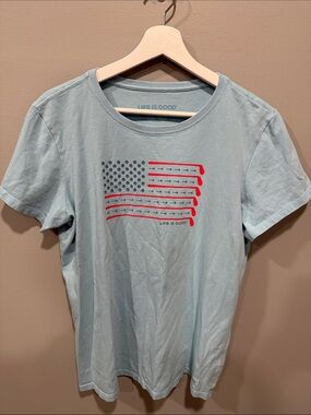 Life Is Good Women’s Light Blue Tee with Red & Navy Flag Graphic